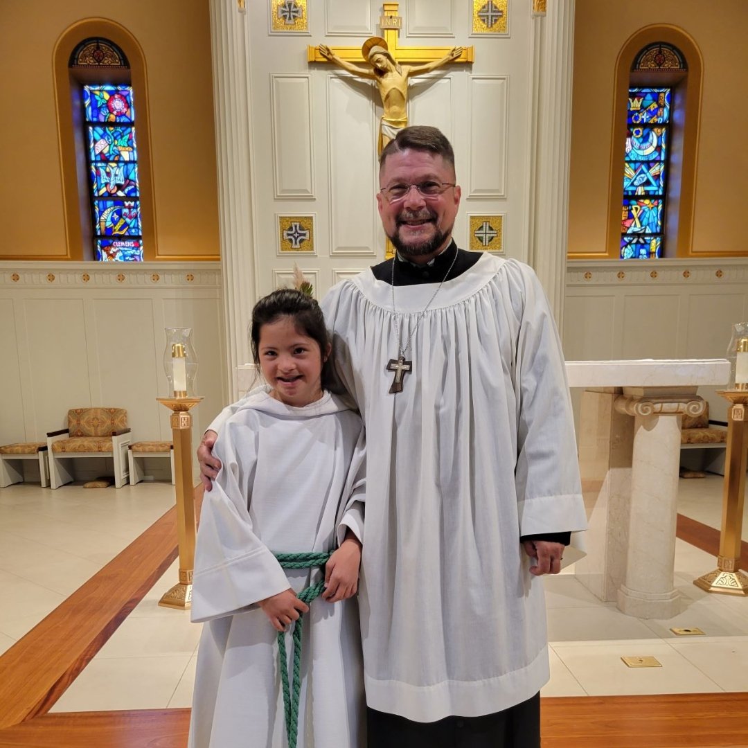 altar server with Down syndrome and server trainer