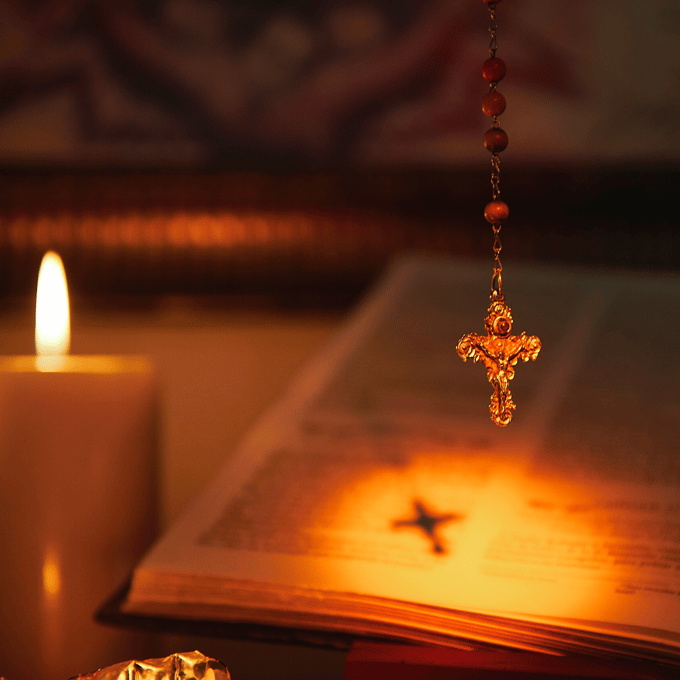 Blessings of the Rosary _ crucifix_open Bible_ and lit candle