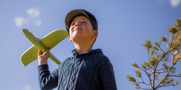 young-boy-play-with-toy-airplaine-in-hands-happy-kid-is-playing-in-park-outdoors.jpg_s=1024x1024&w=is&k=20&c=bPNBDk6DniWXnOUfKxC9AVfZbD3tkQOITCQfv_EpXfA=