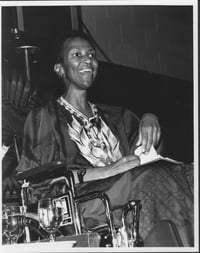 Sister_Thea_Bowman,_on_stage_and_smiling_at_Walsh_University